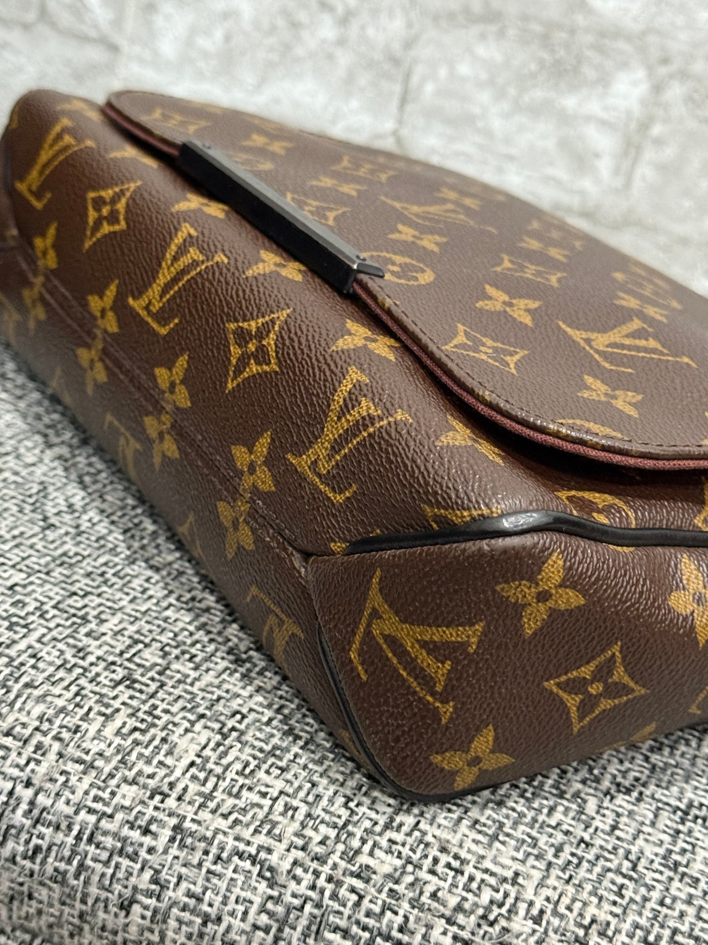 Louis Vuitton 2014 District PM in Monogram