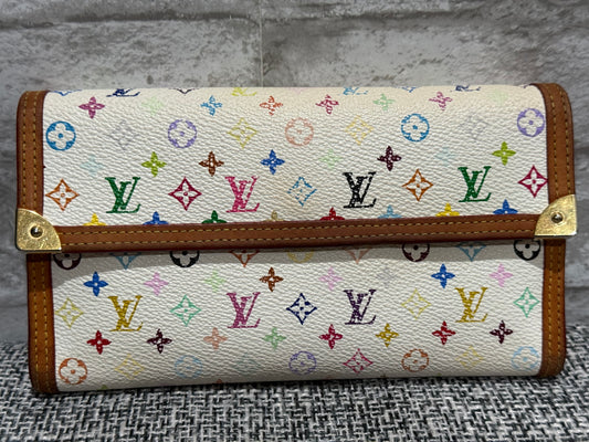 The style is limitless with this vintage Louis Vuitton 2004  limited edition of the Takashi Murakami Wallet