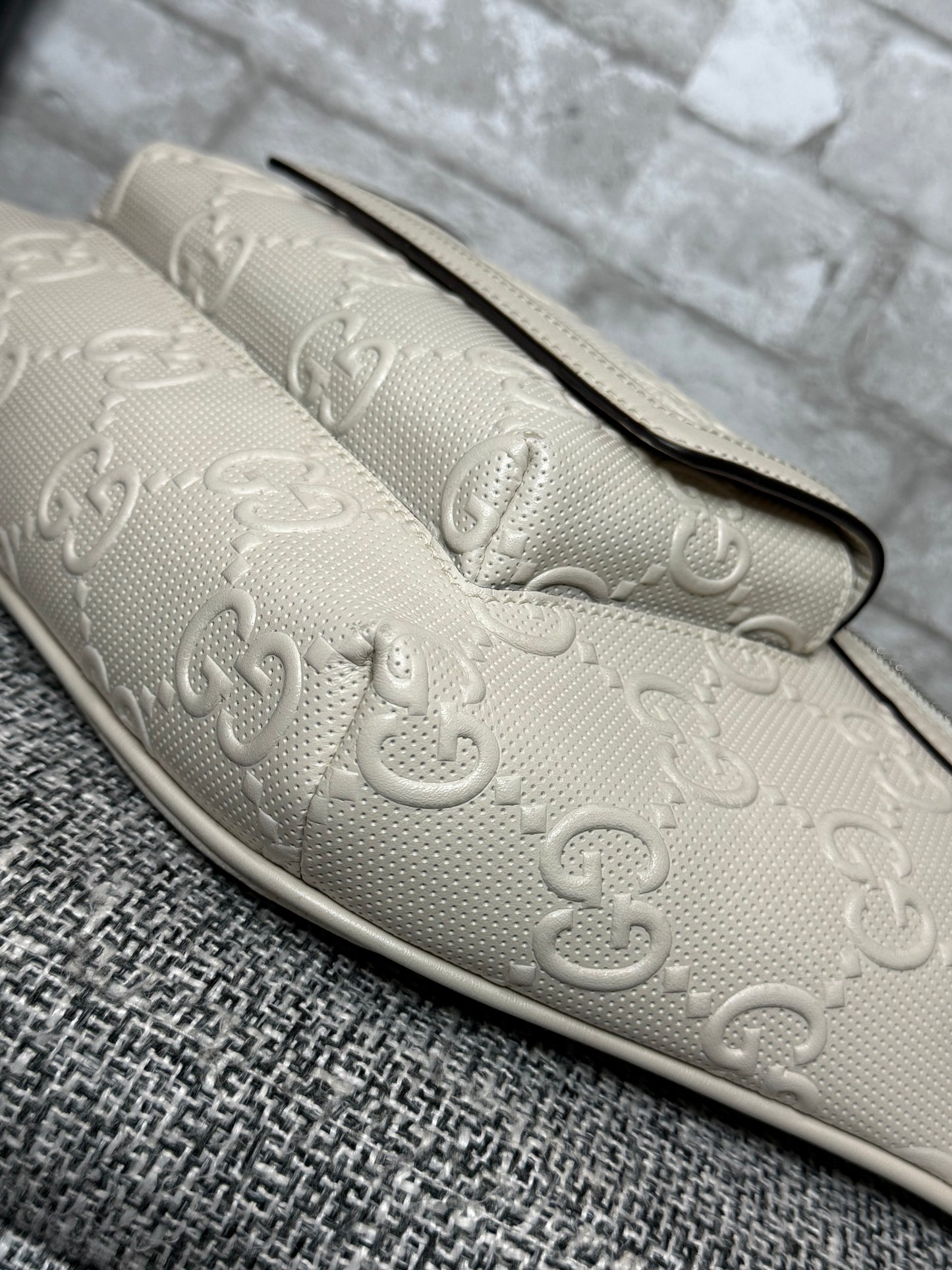 Gucci GG-embossed belt bag