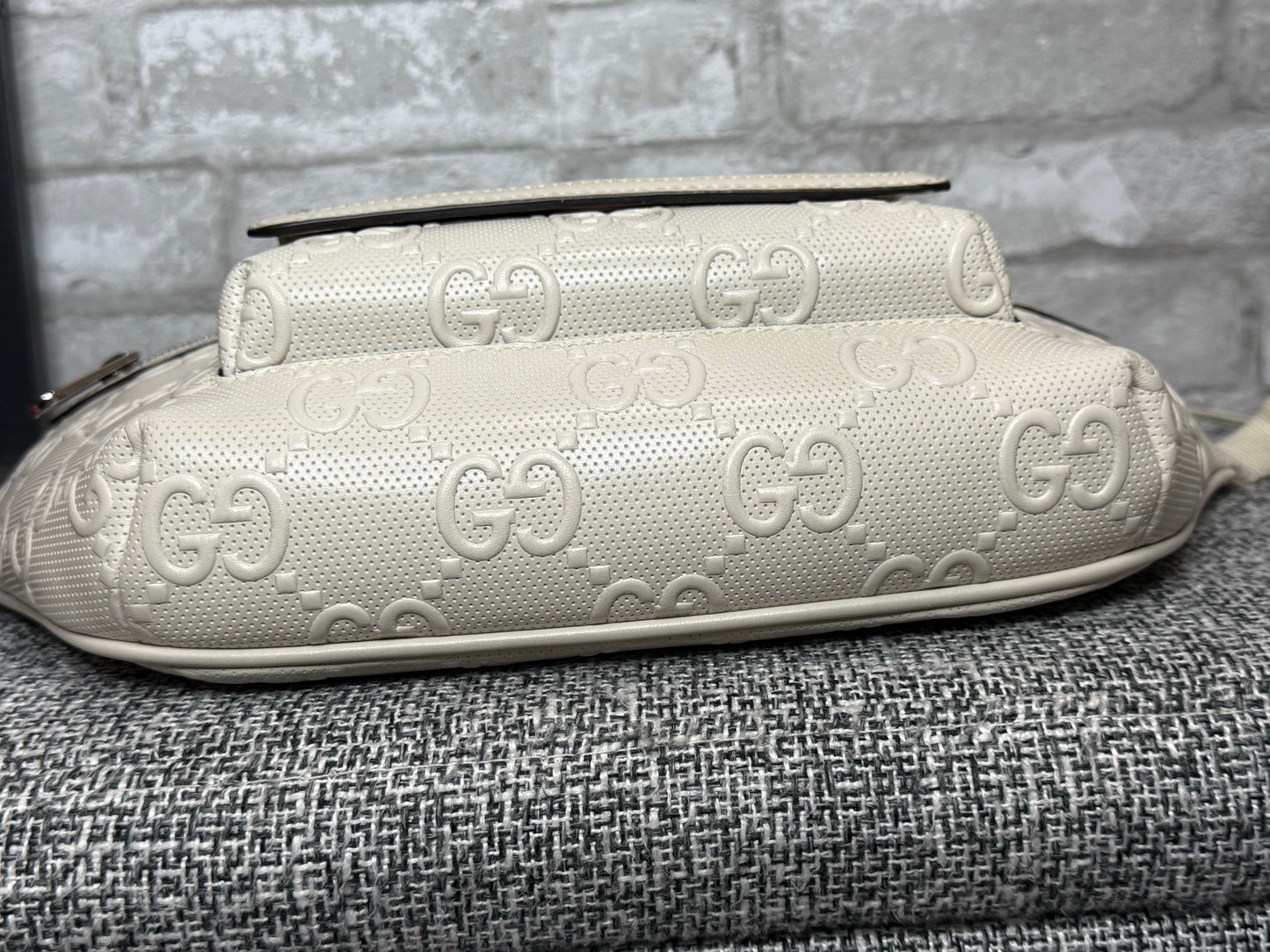Gucci GG-embossed belt bag