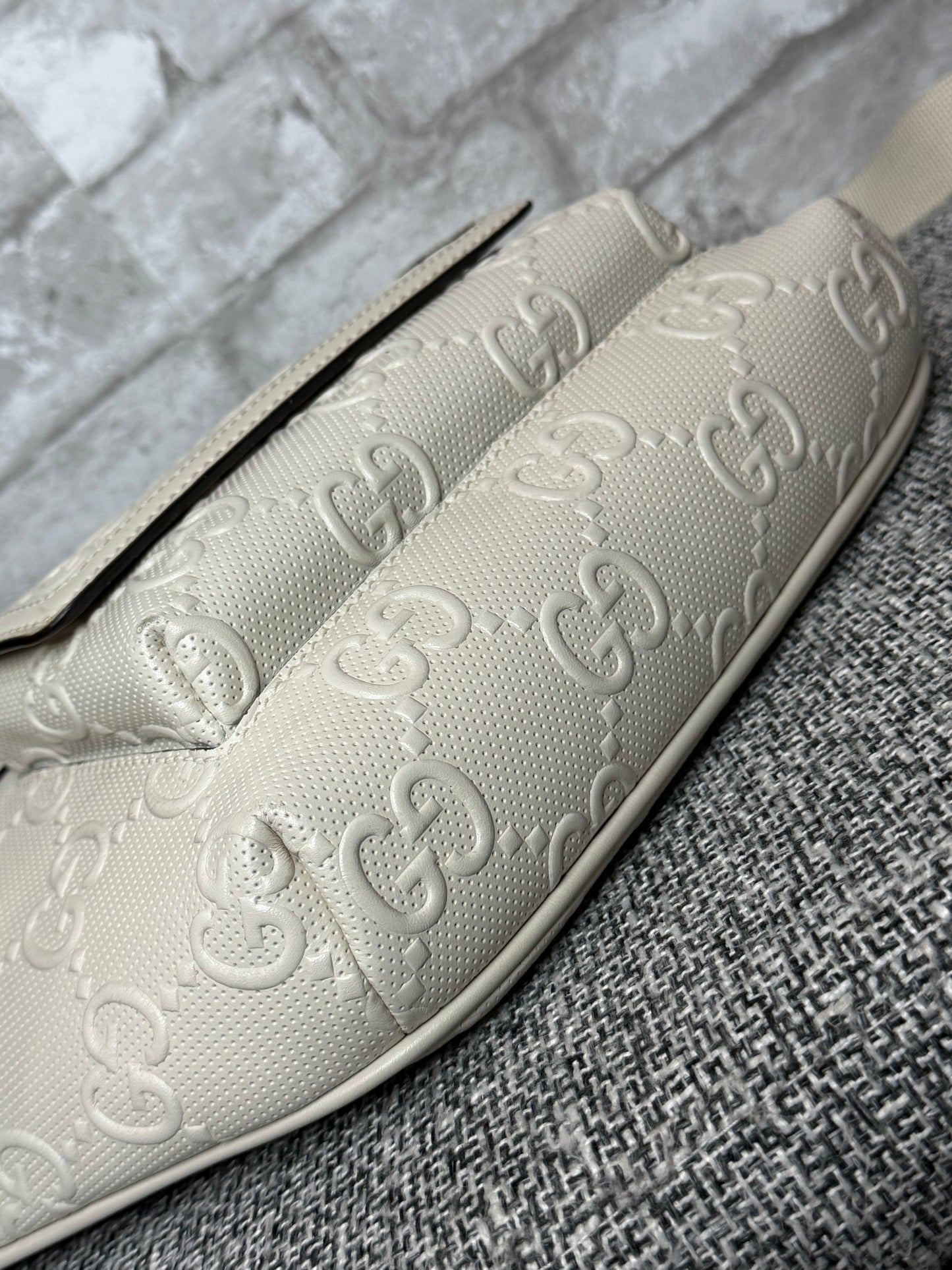 Gucci GG-embossed belt bag